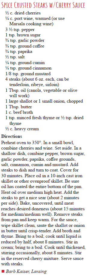 Spice crusted steaks with cherry sauce